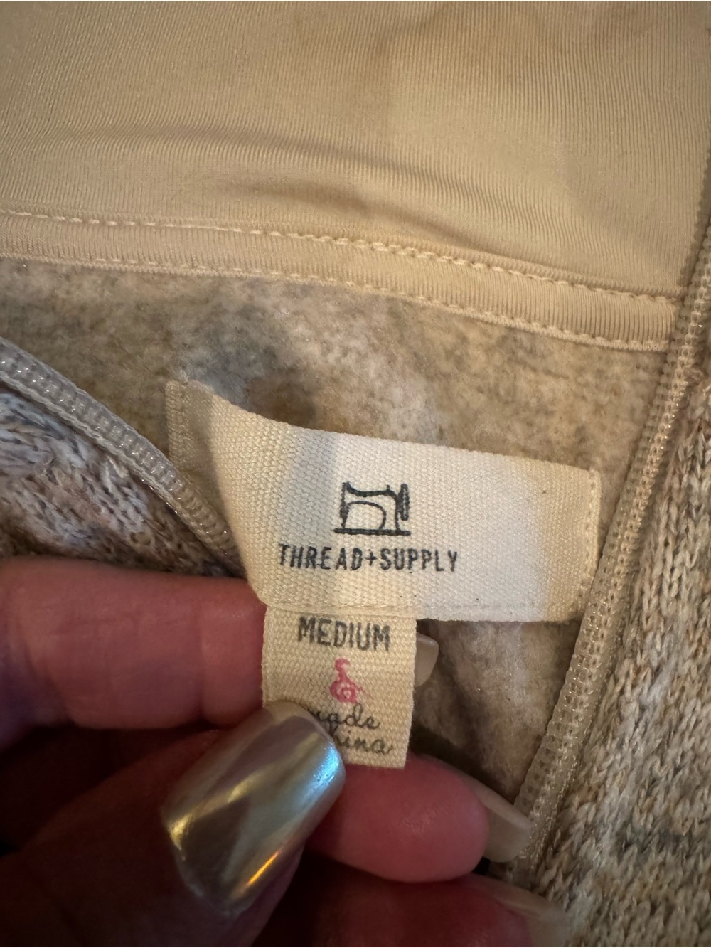 Thread Supply grey fleece partial zip pullover.